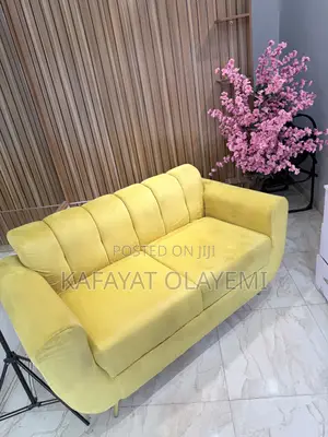 Neatly Used Bright Yellow 2-Seater Sofa