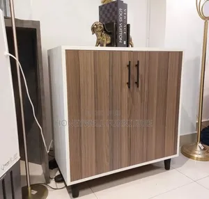 Brown and White Bedroom Cabinet With Doors