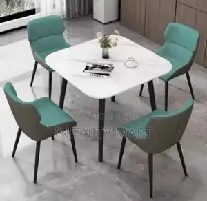Luxury Dining Table Set (4 Chairs) – Grey Marble Top, Teal Seats.