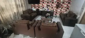 Used Golden Brown Living Room