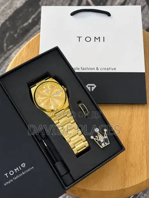 *Tomi Chain Watch* Comes With a Brooch, Ring and a Watch Adjusters,