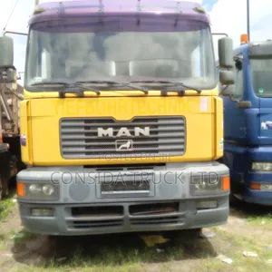 Man Tiga Yellow 1998