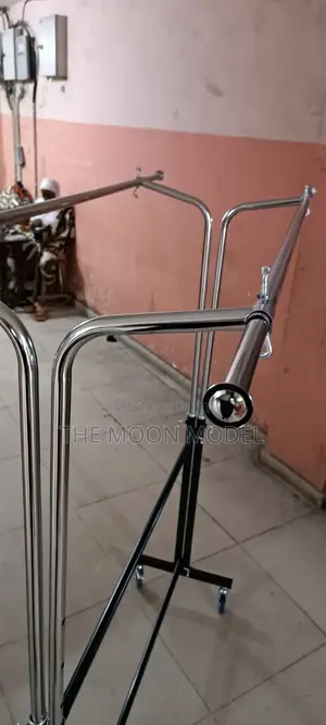 Silver And Black Cloth Rack