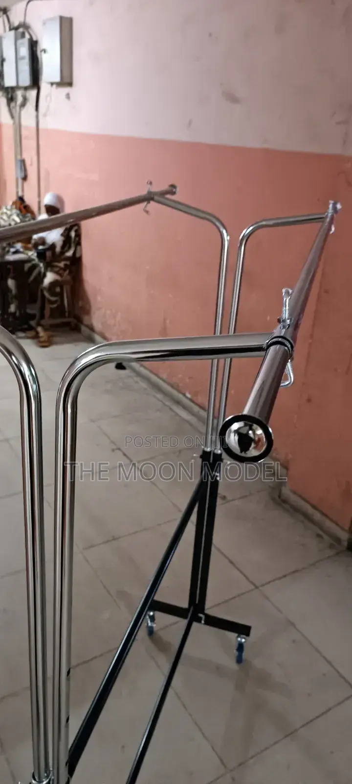 Silver And Black Cloth Rack