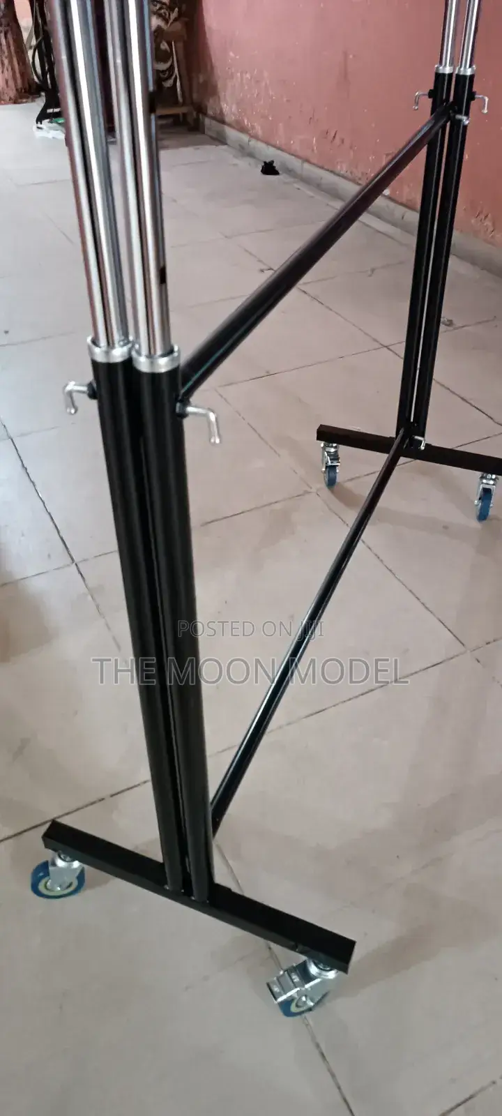 Silver And Black Cloth Rack