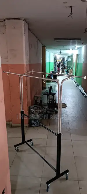 Silver And Black Cloth Rack