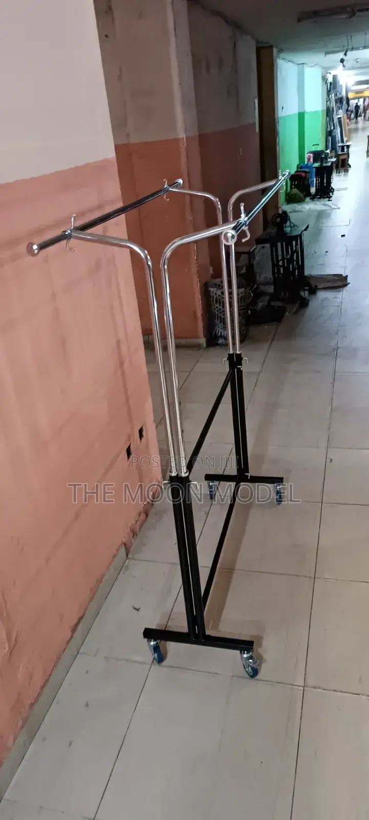Silver And Black Cloth Rack
