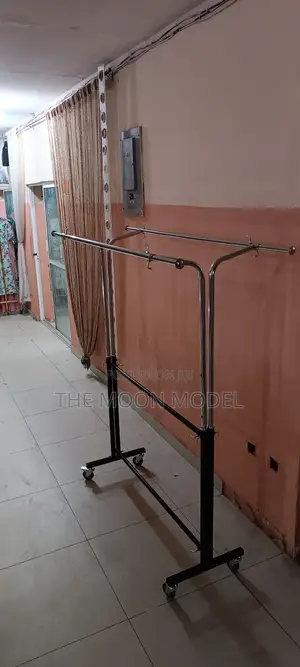 Silver And Black Cloth Rack