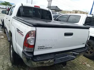 Toyota Tacoma Access Cab 4x4 2.7L 4-Cyl. 5-Speed Manual 2013 White