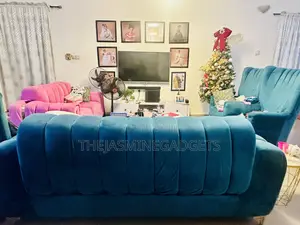 Fairly Used 7 Seater Sofa. With Table and Tv Stand