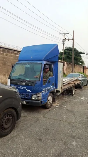 Isuzu NKR Flatbed Truck