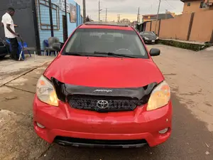 Toyota Matrix XR Hatchback FWD (1.8L 4cyl 4A) 2006 Red
