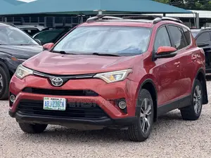 Toyota RAV4 XLE AWD (2.5L 4cyl 6A) 2016 Orange