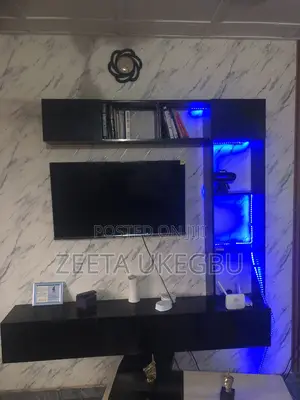 TV Console Set Stand With Multi-Color Lighting and Bookshelves.