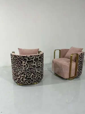 These Accent Chairs Feature a Pink Velvet Seat Complemented