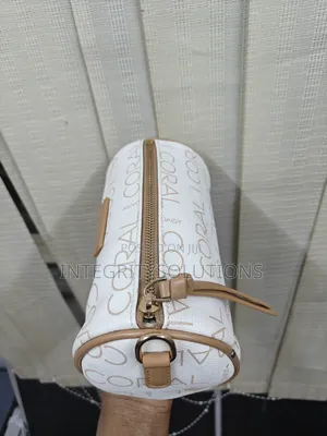 Barrel Clutch Bag