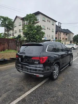 Honda Pilot Touring 4dr SUV 4WD (3.5L 6cyl 9A) 2016 Black