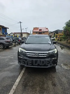 Honda Pilot Touring 4dr SUV 4WD (3.5L 6cyl 9A) 2016 Black