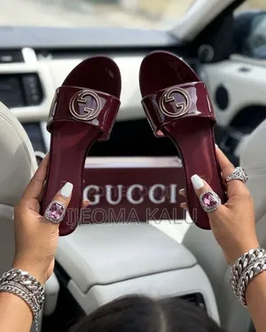 Gucci Slippers and Small Hill