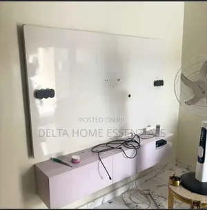 Modern Wall-Mounted TV Console With Backing Panel