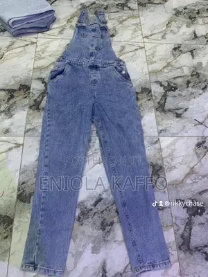 A Blue and Black Jumpsuit Jeans