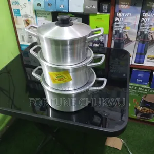 A Set of 3 in 1 Non Stick Silver Pot