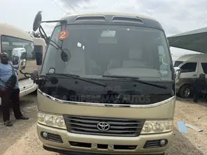 Toyota Coaster 2018 Gold