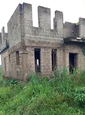 Quater Plot of Land With Building on It