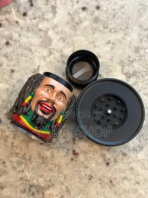 Rastaman in Hat Grinder