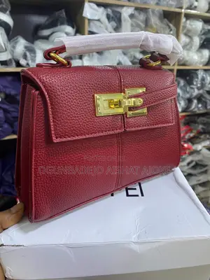 Jwpei Bag Available in Wine Colour Comes With Handfan