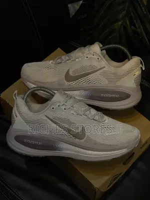 Nike Vomero 18 Plus Running Sneakers in Brown Colorway