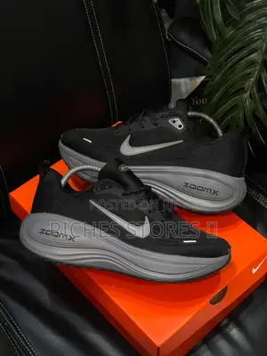 Nike Vomero 18 Plus Running Sneakers in Black Colorway