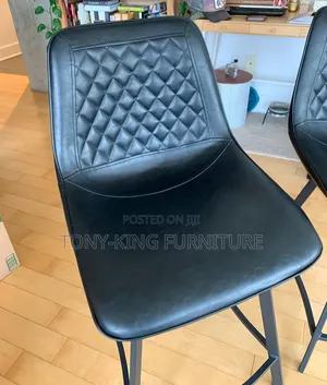 Modern Bar Chair Upholstery on a Sturdy Black Metal Base.