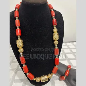 African Unisex Coral Bead With Gold Accessories for All Occasions.
