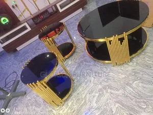3-Piece Round Black Glass Nesting Table Set – Gold Art Deco Rod Frame