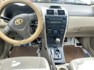 Toyota Corolla LE 4dr Sedan (1.8L 4cyl 4A) 2010 Brown