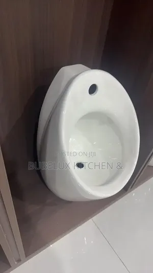 Brand New Compact Wall Mounted Ceramic Urinal-Glossy White Oval Design