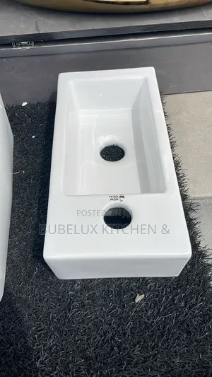 Brand New NEW IDEAL Small Rectangular Basin With Tap Hole