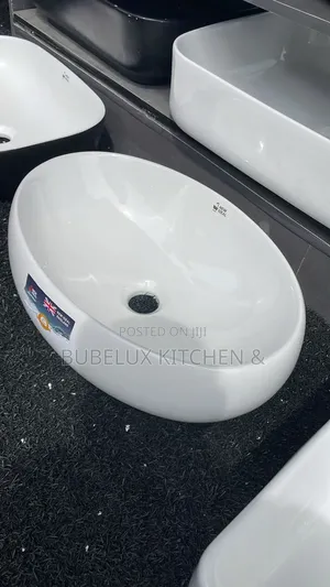 Brand New NEW IDEAL Curved Oval Countertop Basin - Glossy White