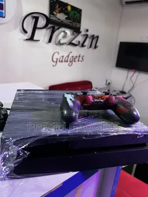Sony PlayStation 4 With Accessories