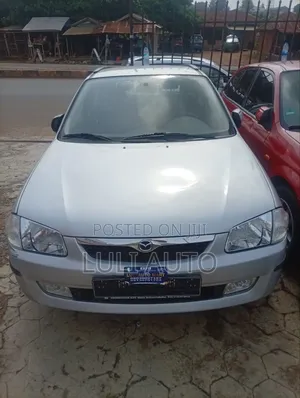 Mazda 323 1999 Silver