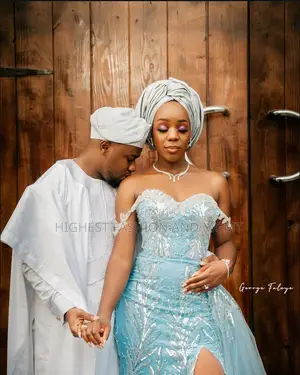 Icy Blue Bridal Gown With Matching Gele Minimalist White Agbada Set