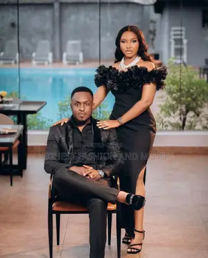 Ruffled Black Gown With Pearl Accessories Black Blazer Ensemble