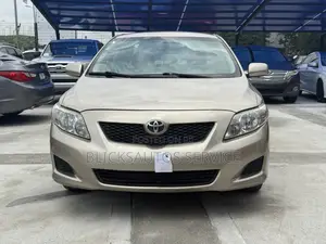 Toyota Corolla LE 4dr Sedan (1.8L 4cyl 4A) 2010 Gold