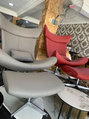 High-Back Lounge Chair With Ottoman – Leatherette Swivel Base,