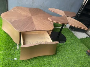 Luxury Coffee Table Set a Wooden Top With a Side Stool Black Base.
