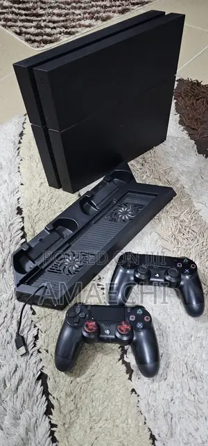 PS4 Fat Console + 2 Controllers