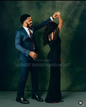 Black Floor-Length Evening Gown and Navy Blue Tailored Suit