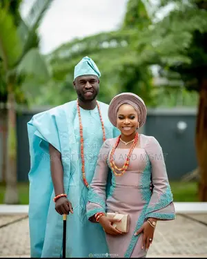 Mauve Gown and Sky Blue Agbada Set