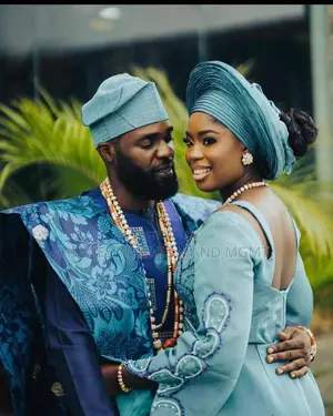 Teal Aso-Ebi Gown and Patterned Agbada